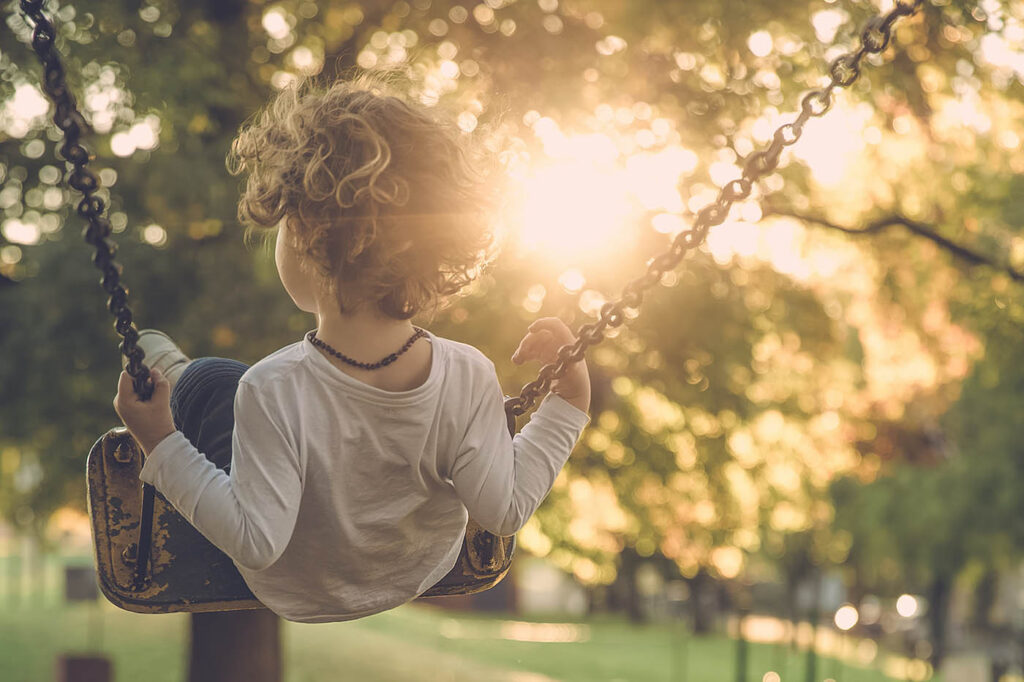 picture of child swinging
